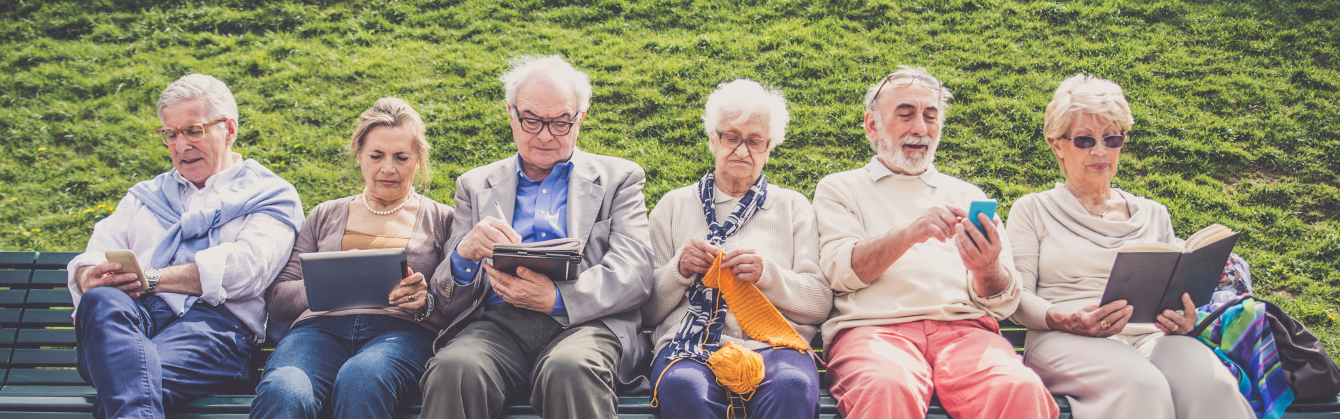 Group people sitting down and reading